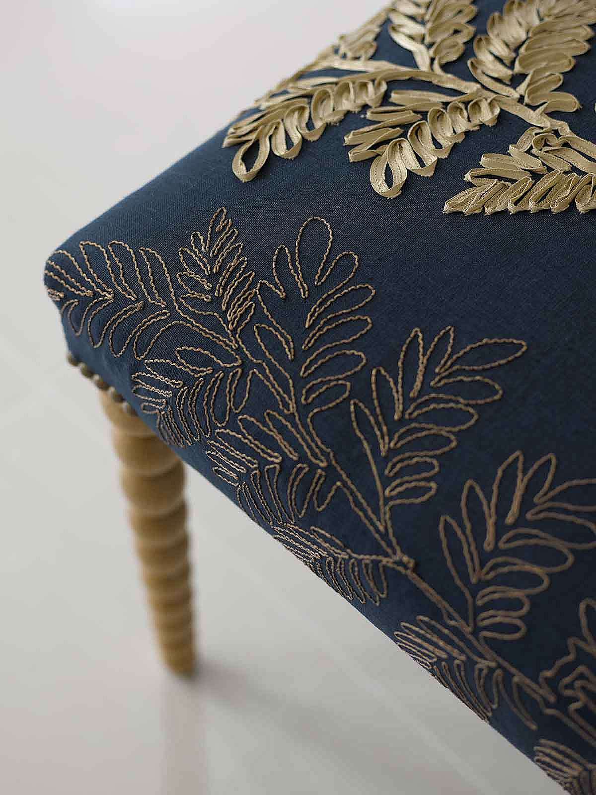 Hand made hallway stool with hand turned bobbin legs and close nailing detail